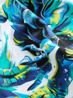 Dino blanc/bleu - T-shirt imprimé graphique à manches courtes coupe régulière (3-16ans)