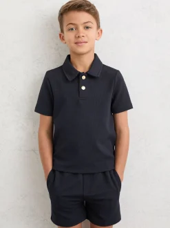 Ensemble Reiss Vola Polo gaufré et Shorts