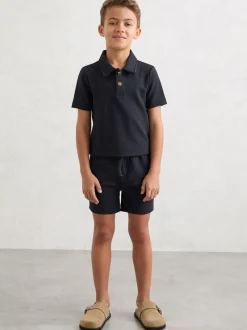 Ensemble Reiss Vola Polo gaufré et Shorts