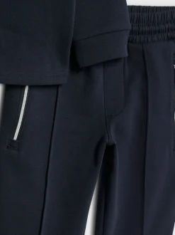 Ensemble River Island quart de zip en entonnoir et jogging