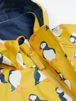 Frugi imperméable imprimé Buster jaune