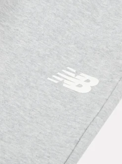 Gris - Jogging New Balance en French terry à logo empilé