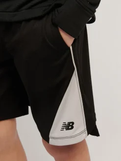 Noir - Shorts de football New Balance à empiècements